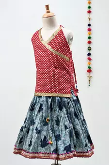 blue and red cotton leaf printed lehenga with a contrast choli and golden lace