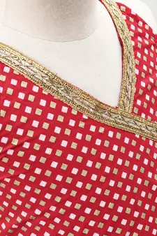 blue and red cotton leaf printed lehenga with a contrast choli and golden lace