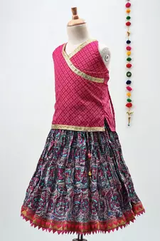 Pink and Blue cotton lehenga with a contrast self print halter neck choli and a golden lace