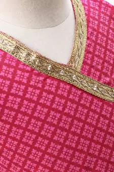Pink and Blue cotton lehenga with a contrast self print halter neck choli and a golden lace