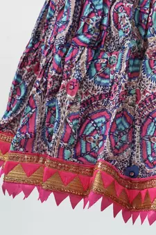 Pink and Blue cotton lehenga with a contrast self print halter neck choli and a golden lace