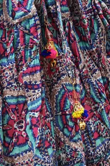 Pink and Blue cotton lehenga with a contrast self print halter neck choli and a golden lace