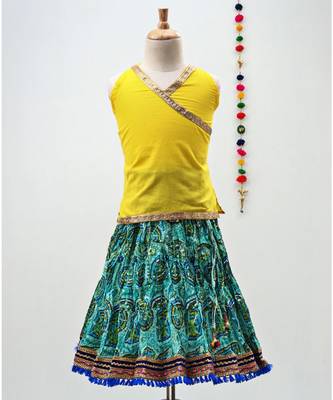 green and yellow cotton lehenga with a contrast  halter neck choli and a golden lace 1