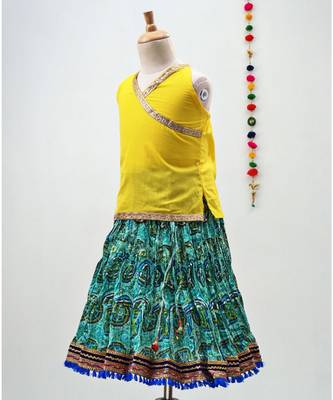 green and yellow cotton lehenga with a contrast  halter neck choli and a golden lace 2