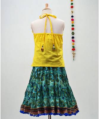 green and yellow cotton lehenga with a contrast  halter neck choli and a golden lace 3