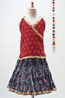 blue and red cotton printed lehenga with a contrast self print halter neck choli and a gold lace