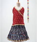 blue and red cotton printed lehenga with a contrast self print halter neck choli and a gold lace