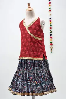 blue and red cotton printed lehenga with a contrast self print halter neck choli and a gold lace