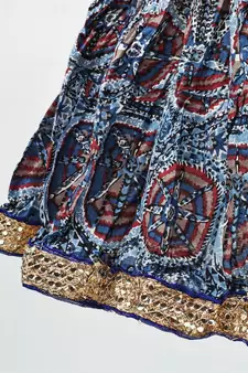 blue and red cotton printed lehenga with a contrast self print halter neck choli and a gold lace