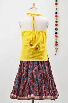 multicolor cotton printed Lehenga with a contrast halter neck choli and a lovely golden  lace