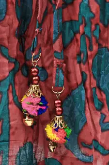 multicolor cotton printed Lehenga with a contrast halter neck choli and a lovely golden  lace