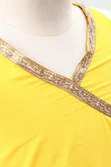 multicolor cotton printed Lehenga with a contrast halter neck choli and a lovely golden  lace