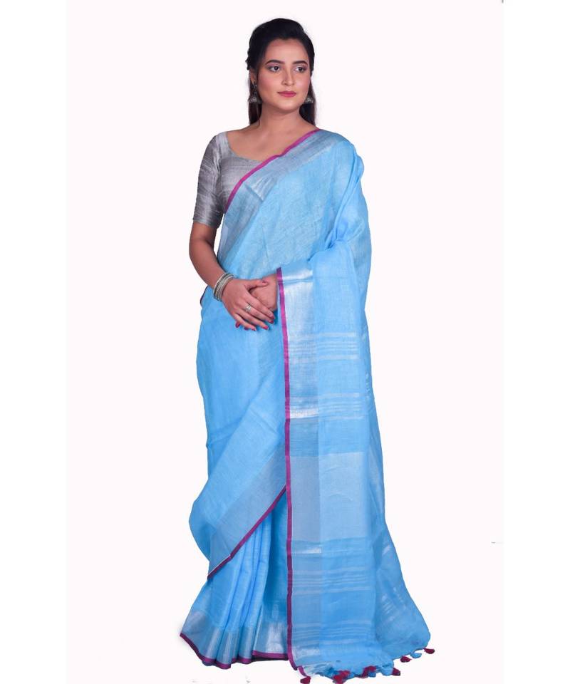 Handcrafted Blue Linen saree with Silver zari border