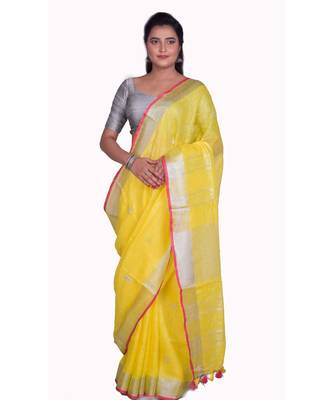 Handcrafted Yellow Linen saree with Silver zari border and beautiful embroidery work 1