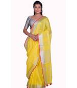Handcrafted Yellow Linen saree with Silver zari border and beautiful embroidery work