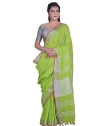 Handcrafted Parrot Green Linen saree with Silver zari border
