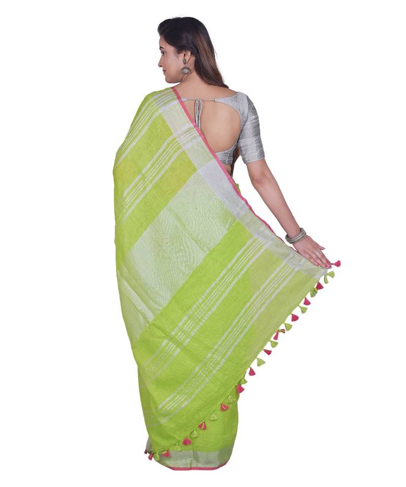 Handcrafted Parrot Green Linen saree with Silver zari border
