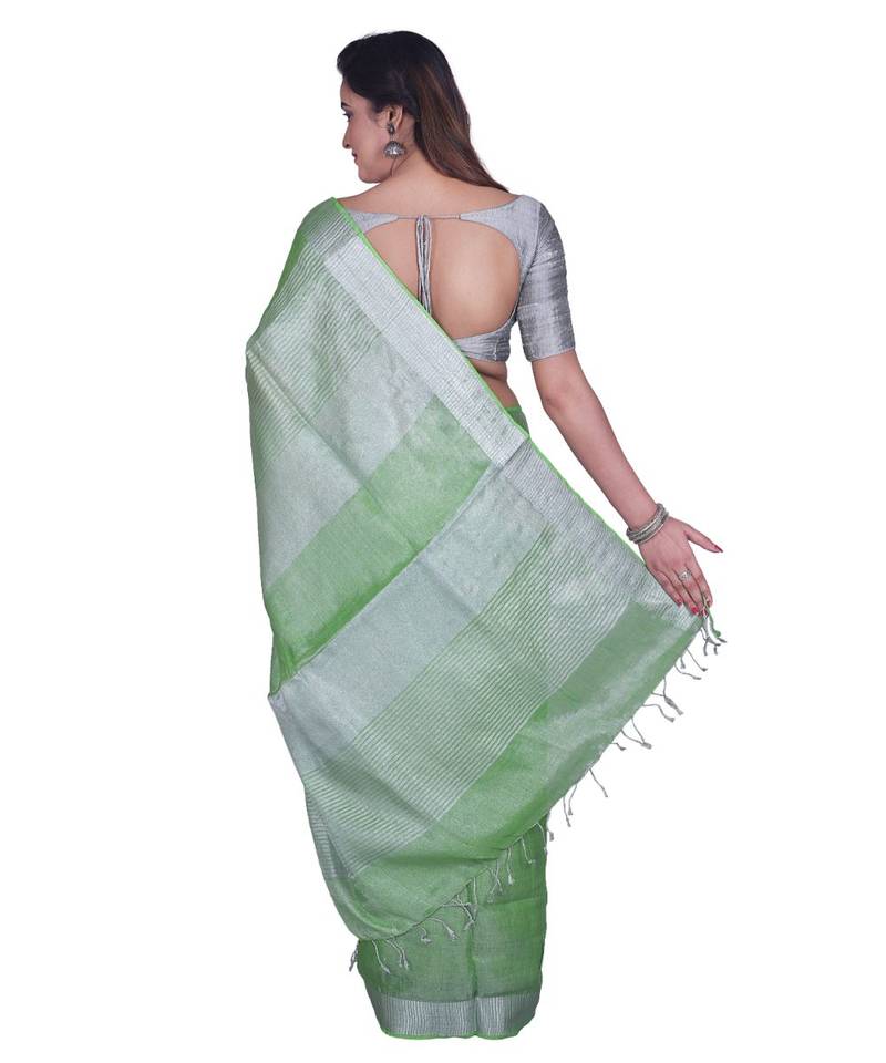 Handcrafted Light Green Silver Tissue Linen saree with silver Zari border