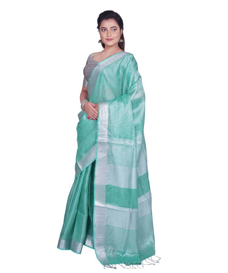 Handcrafted Sea Green Tissue Linen saree with silver Zari border