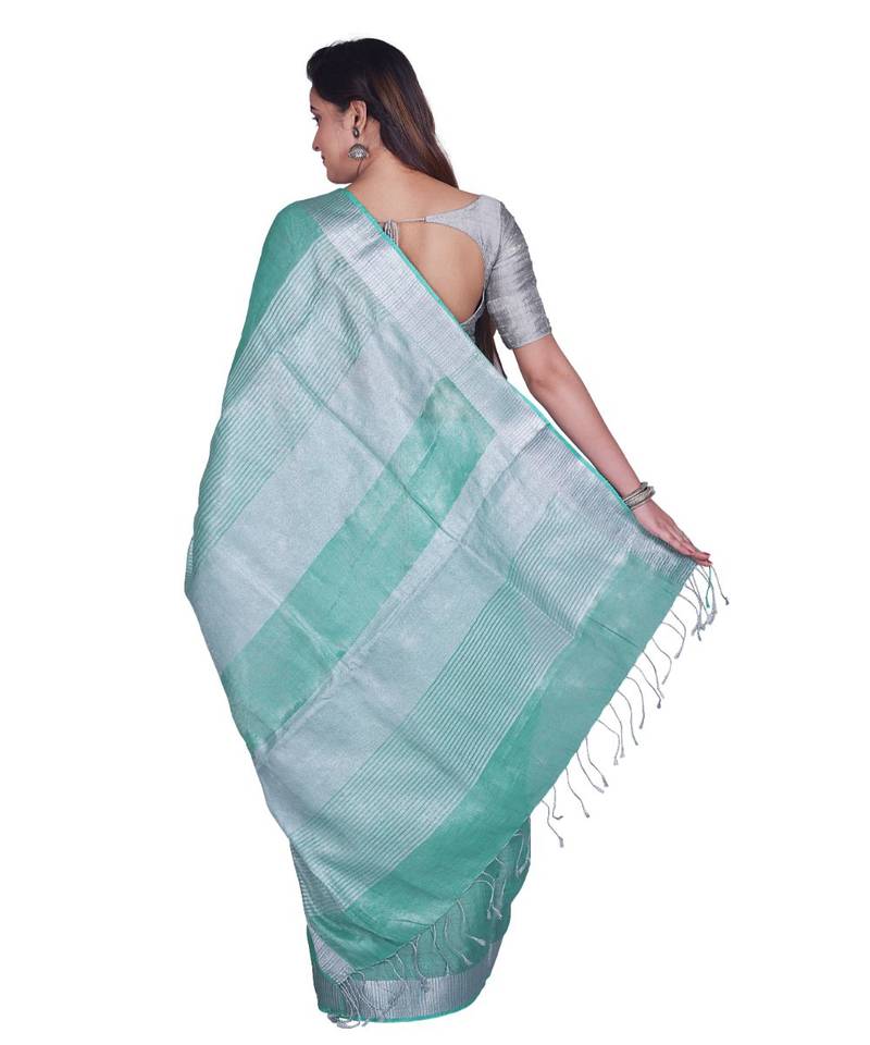 Handcrafted Sea Green Tissue Linen saree with silver Zari border