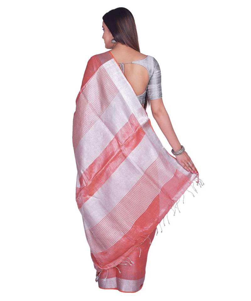Handcrafted Rust Orange Shade Tissue Linen saree with silver Zari border