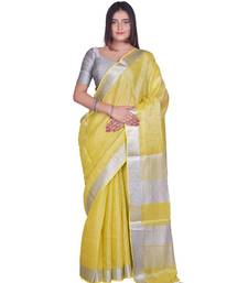 Handcrafted Lemon Yellow Tissue Linen saree with silver Zari border