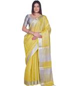 Handcrafted Lemon Yellow Tissue Linen saree with silver Zari border