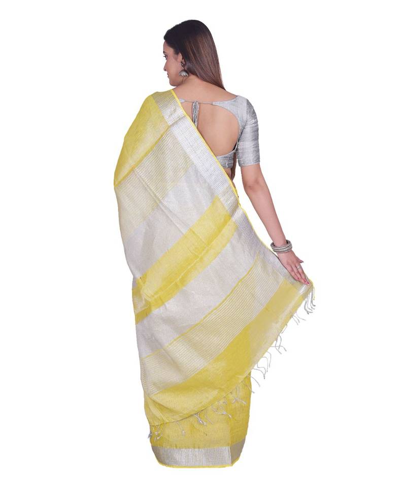 Handcrafted Lemon Yellow Tissue Linen saree with silver Zari border