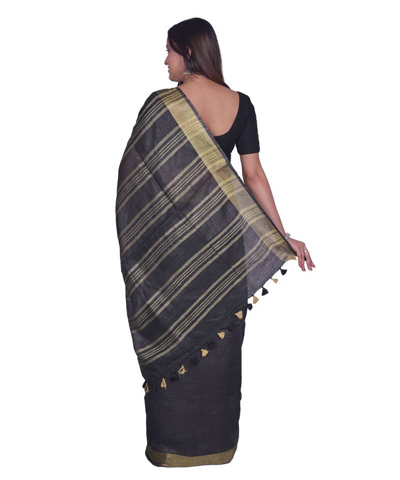 Handcrafted  Black Linen saree with golden zari border