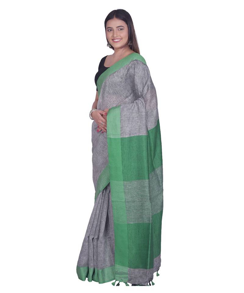 Handcrafted  Grey Linen saree with contrast Green  border