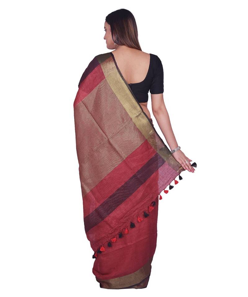 Handcrafted  Dark Maroon Shade Linen saree with golden zari border