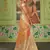 Orange woven banarasi silk saree with blouse