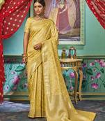 Yellow woven banarasi silk saree with blouse