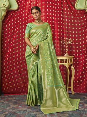   light green woven banarasi silk saree with blouse 1