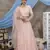 Peach Thread embroidered net Semi Stitched bridal lehenga