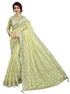 Green embroidered net saree with blouse 1