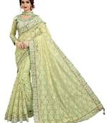 Green embroidered net saree with blouse