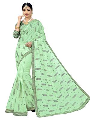 Green embroidered tissue saree with blouse 1