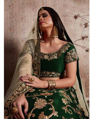 Green embroidered velvet semi stitched lehenga 4