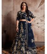 Blue embroidered velvet semi stitched lehenga