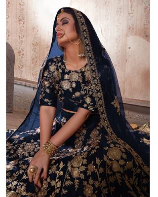 Blue embroidered velvet semi stitched lehenga 4
