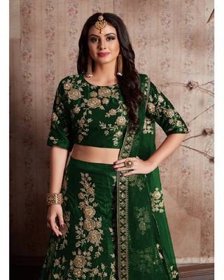 Green embroidered velvet semi stitched lehenga 3
