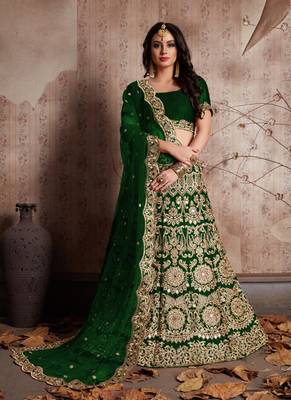 Green embroidered velvet semi stitched lehenga 2