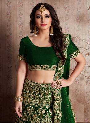 Green embroidered velvet semi stitched lehenga 3