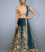 Green embroidered velvet semi stitched lehenga