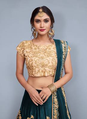 Green embroidered velvet semi stitched lehenga 2