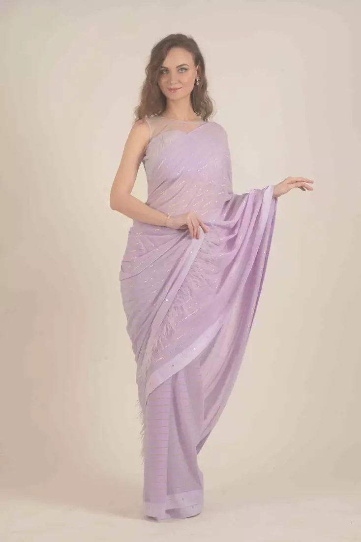 Rina Dhaka pure georgette saree with golden stripe with fur detail in palla with stiched blouse