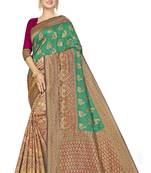 Green woven banarasi silk saree with blouse
