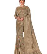 Beige woven silk blend saree with blouse