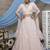 Peach Thread and Sequis=embroidered net Semi Stitched bridal lehenga